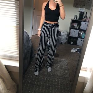 Black and white pinned striped flowy pants